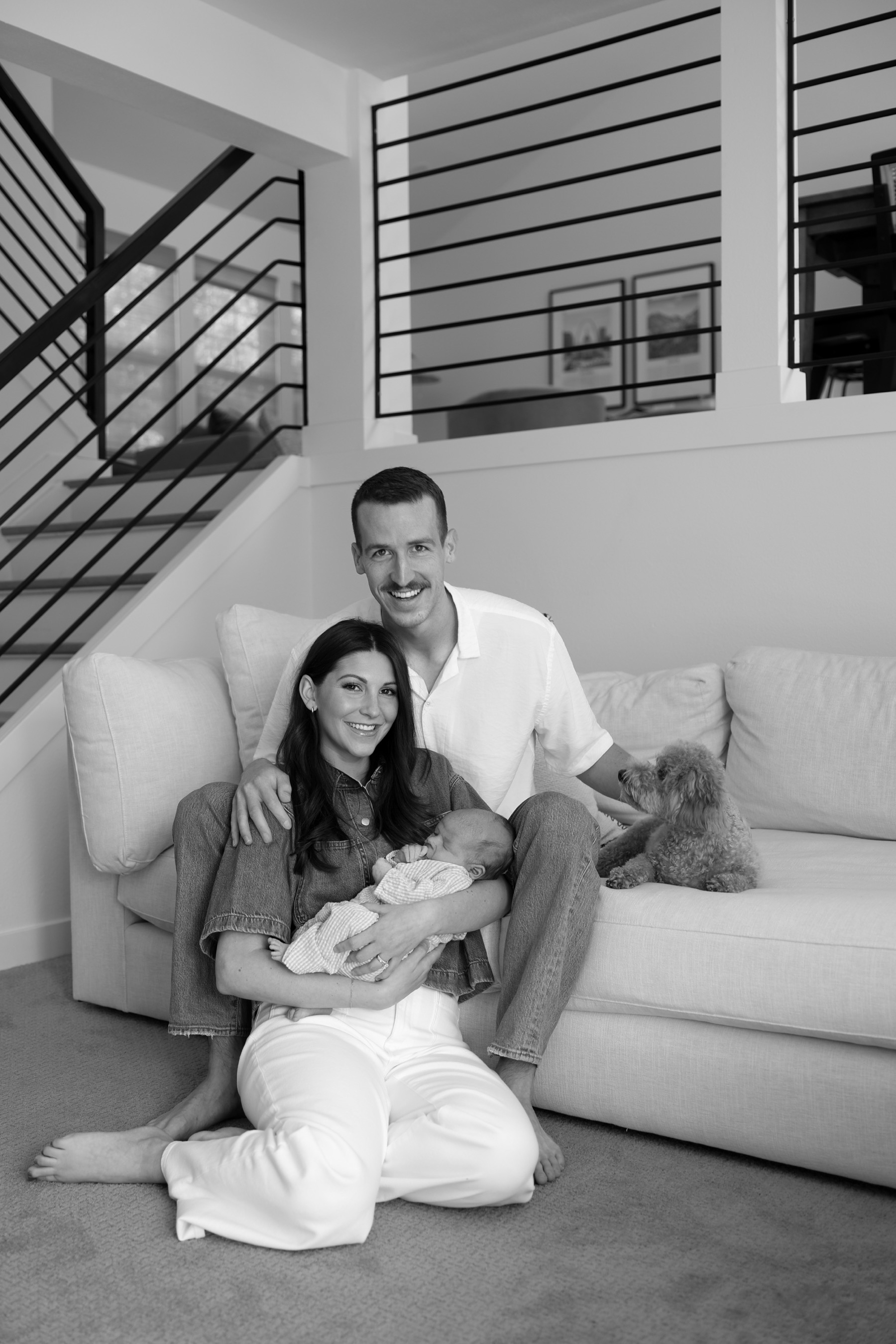 Clay Feldman with his wife Mia, son Brooks, and dog Louie at home